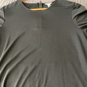 Calvin Klein black tee shirt with really cute zipper detailing in back size medi